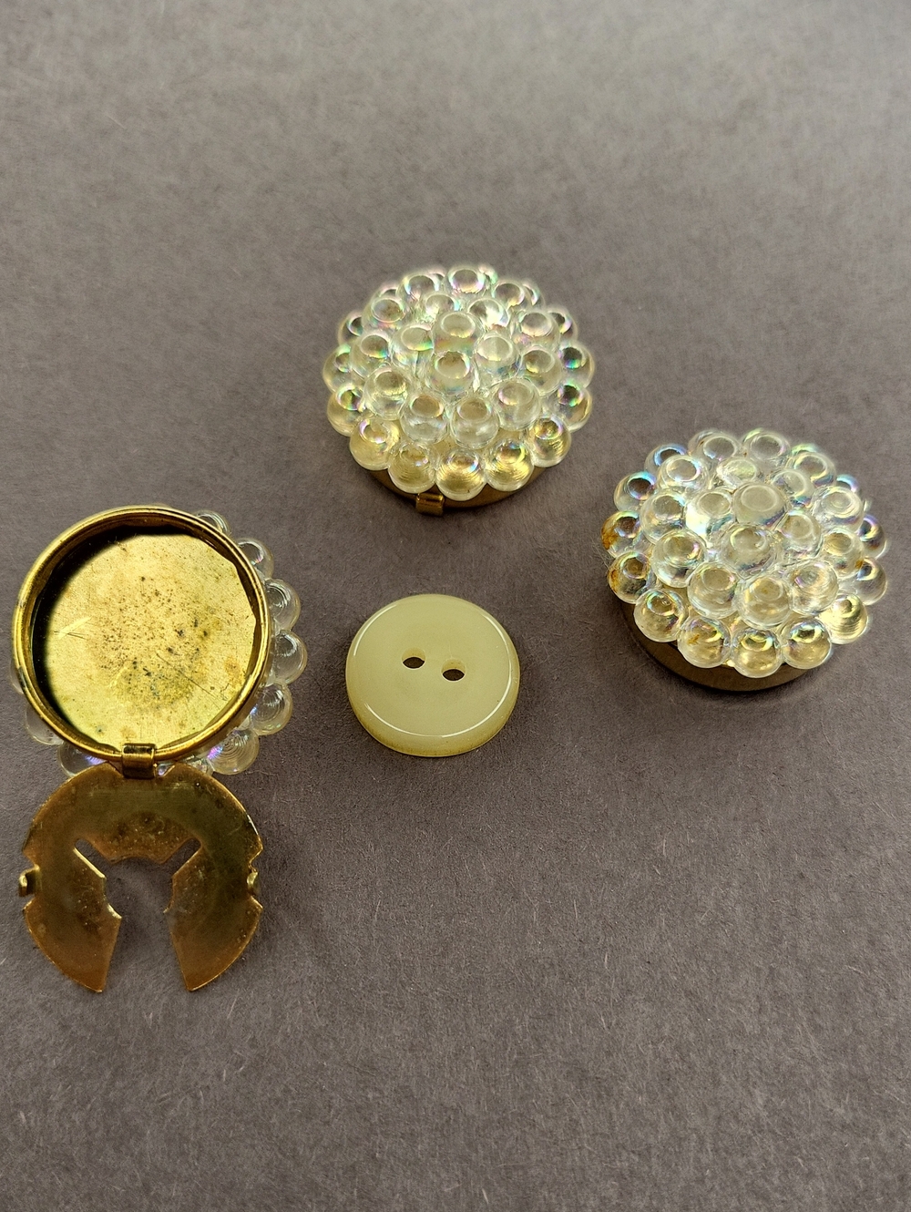 Elegant Gold and Iridescent Button Holder